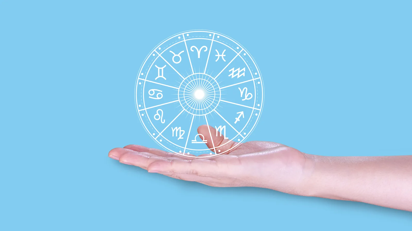 Natal chart with second house highlighted beside coins, symbolizing financial freedom through astrology