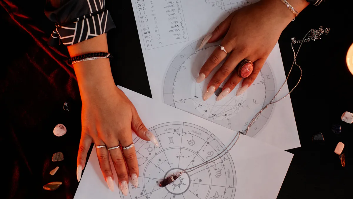 part of fortune calculator: hands reading astrology chart illustration